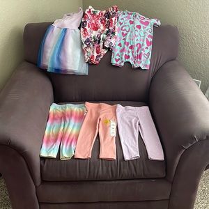 One dress, three pair of pants, two onesies